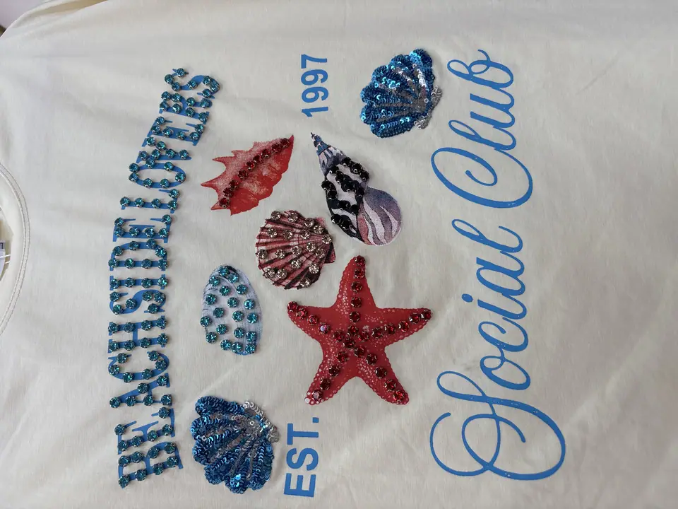 Blusa de conchas