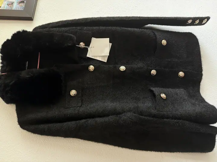 Suéter peluche con botones