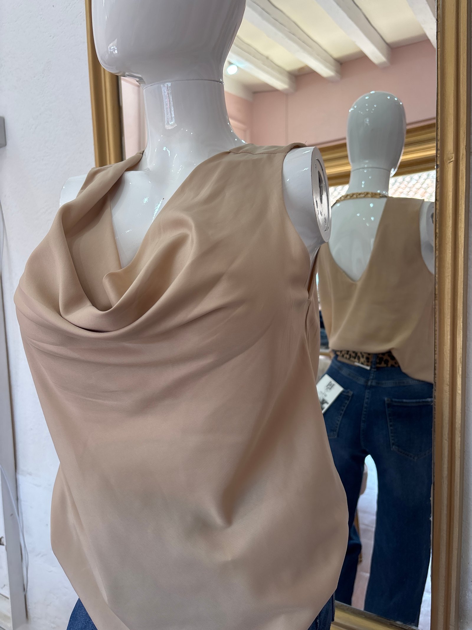 Blusa olgada cadena espalda