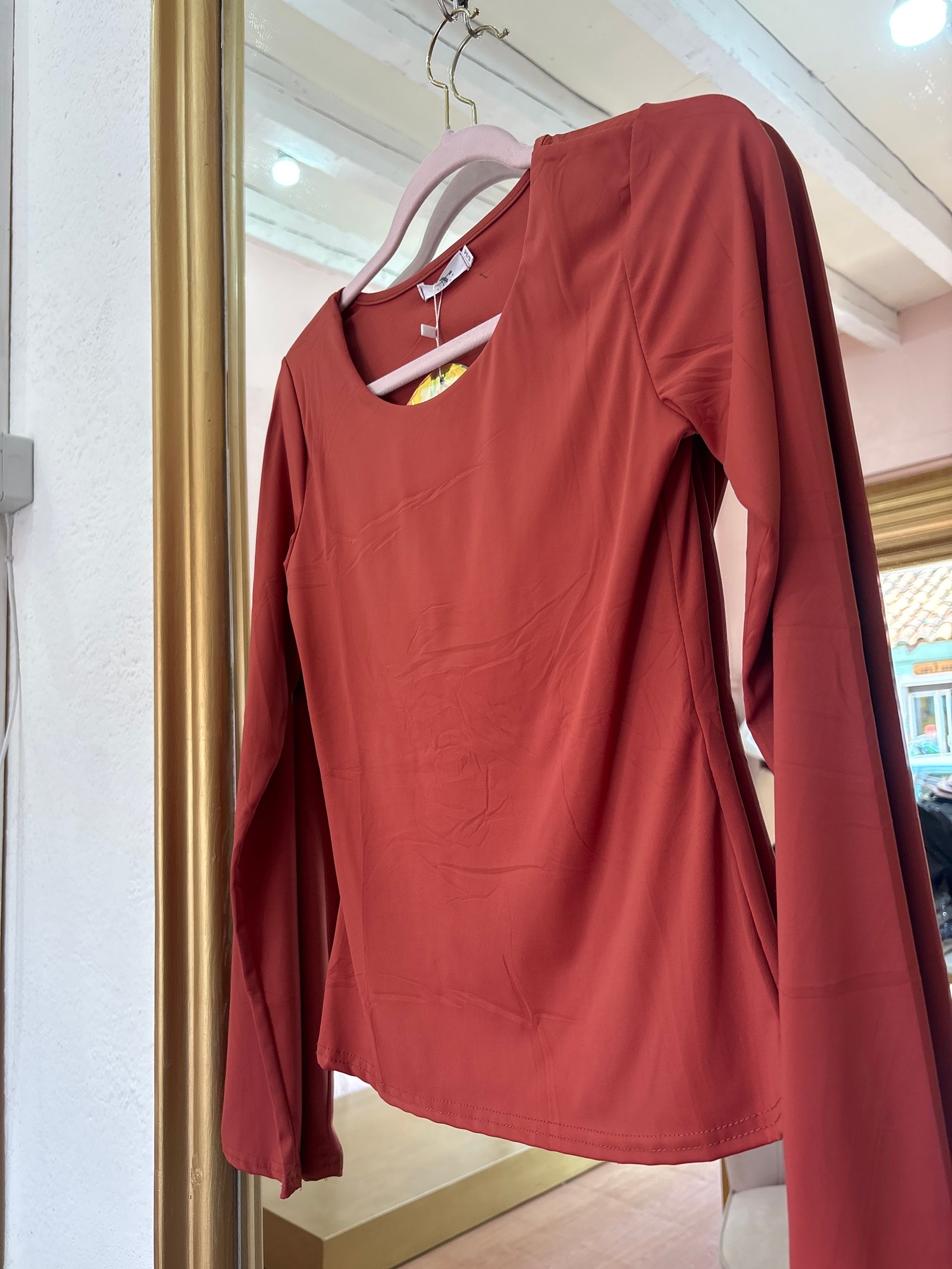 Blusa ladrillo manga larga