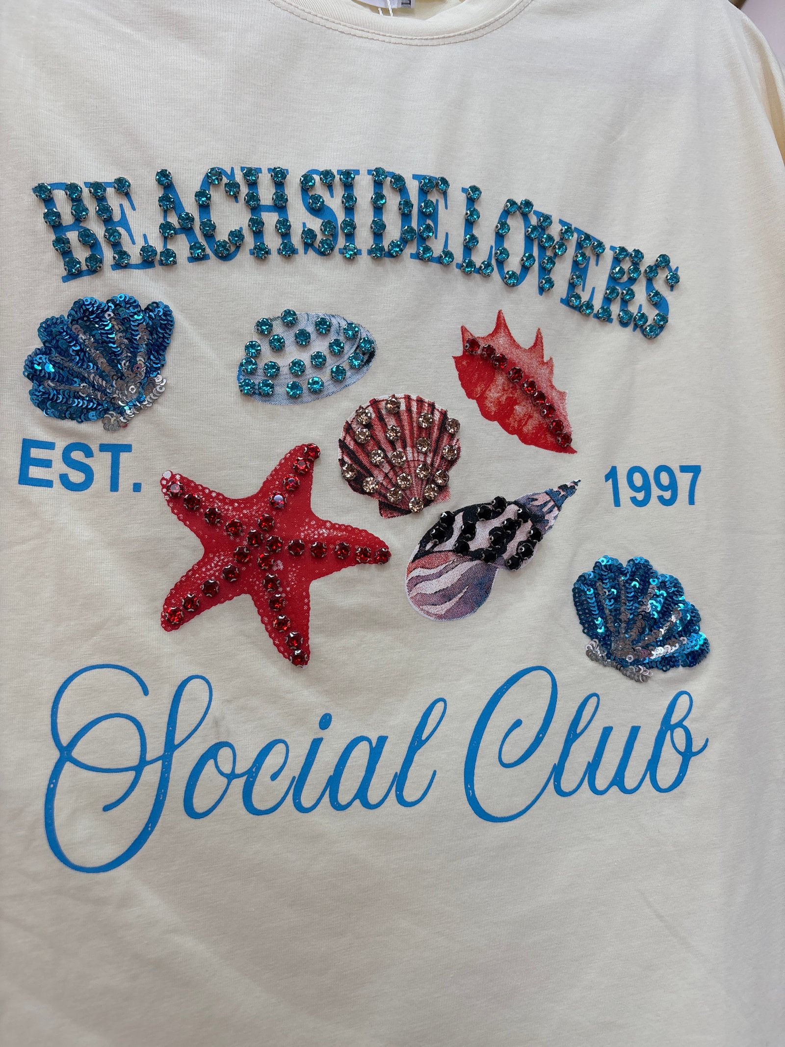 Blusa de conchas