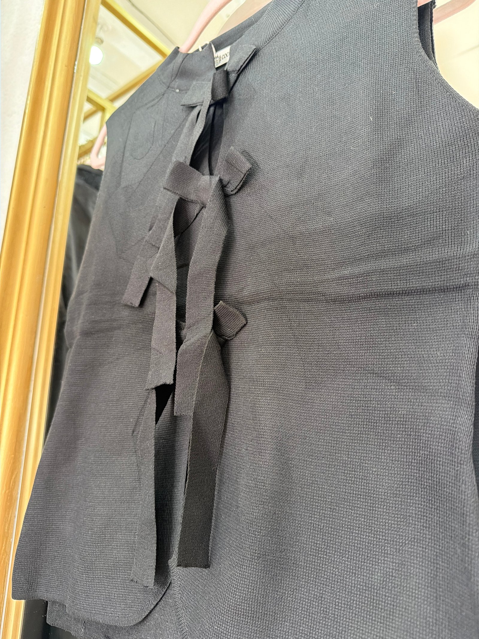 Conjunto negro con moños